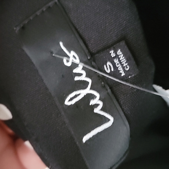 LULUS Pleated Tiered Dress In Black Polka Dot - Picture 9 of 11